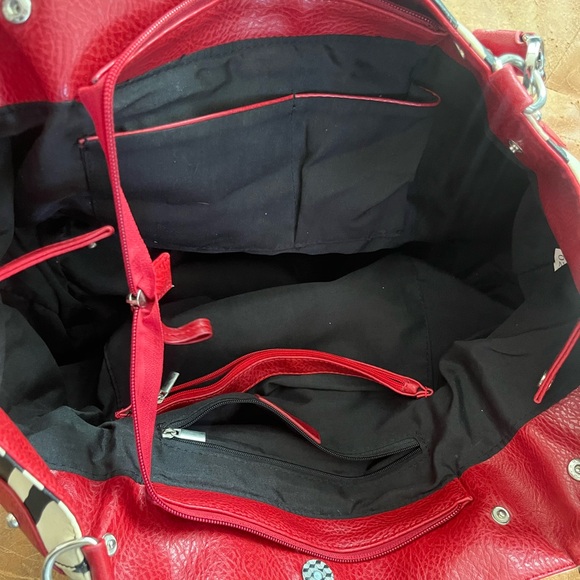 Zebra with red handles tag says Dooney and Bourke. No interior tag. - Picture 2 of 5